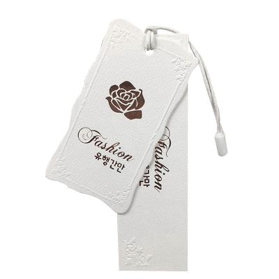 China Recyled Special Paper Hang Tag Customized Bronzing Cored Process Clothing Store Logo Customized Te koop