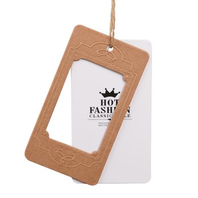 China Universal High-Grade Recyled Apparel Hangtag Hollowed Out Thickened Embossed Three-dimensional Concave Convex Custom Label Printing Fre Te koop