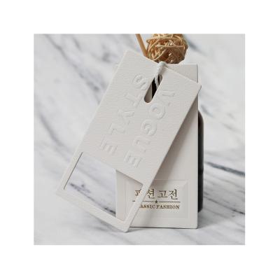 China Zd Custom Made Eco Friendly Oem Design Rose Gold Print Hangtag Paper Hang Tag Fold Hang Tags For Garment Te koop