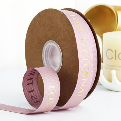 China Viable Wholesale Polyester Grosgrain Ribbon With Logo Foil Gold Printed For Gift Packing à venda