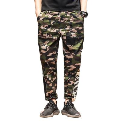 China Windproof Elastic Force Loose Trotter Pants Travel Motor Men Camouflage Pants Elastic Waist Ninth Pants for sale