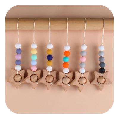 China Star BPA Silicone Teether Beads Stroller Free Pendant Wooden Ring Wooden Baby Play Gyms for sale