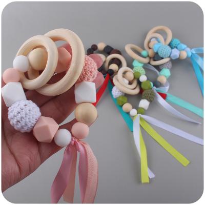 China Soft Strap Toy Silk Ribbon Baby Teether Newborn Boy Girl Nursing Sensory Toy Pacifier Teethers Eco-Friendly Rattle for sale