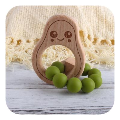 China Toy Newest Avocado Shape Beech Soft Wooden Baby Teether For Chew Rodent Teether Care Bracelet for sale