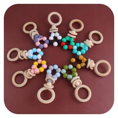 China Soft Creative Wooden Beaded Wooden Beaded Teether Necklace Rabbit Hook Stick Baby Toy Molar Teether Necklace for sale