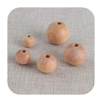 China 9mm 12mm 15mm 18mm 20mm Natural Wooden Round Chewable Beech Wood Safe Rounds Loose Beads For Baby Teething for sale