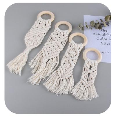 China New Baby Eco-Friendly Natural Teether Toy Hand Woven Cotton Rope Ring Infant Teeth Grinding Stick Wooden Style for sale