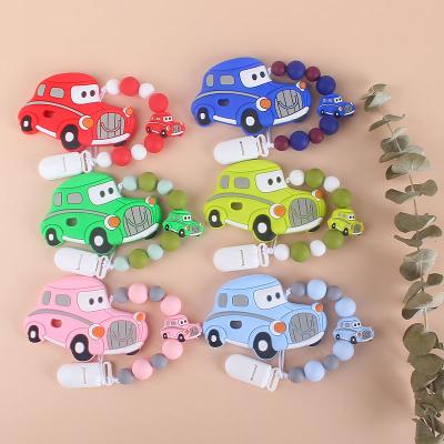 China 2Pcs/Set Baby Car Teether Toy Teeth Grinding Stick Classic Silicone Pacifier Chain BPA Free for sale