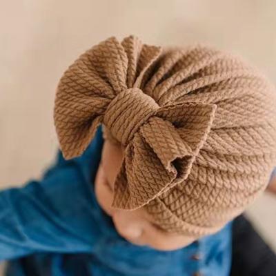 China Soft Baby Kids Cotton Baby Fashion Turban Elastic Bowknot Baby Beanie Hat For Newborn Hood Autumn Winter Children Hat Caps for sale