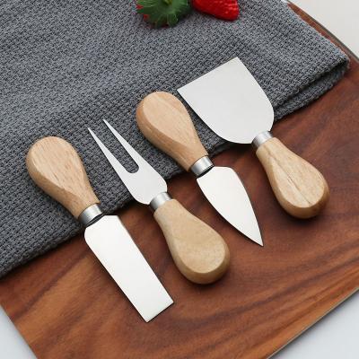 China Unique Viable 4pcs Cheese Knife Tool Kit Wood Handle Stainless Steel Cheese Knife Set For Cheese Pizza for sale