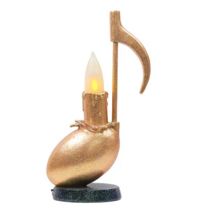 China Polyresin Contemporary Golden Luxury Simulate Metal Music Note Decoration Sculpture With LED Candle Light for sale