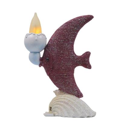 China Europe resin crafts Xiamen polyresin fish animal figurine with led flame light for sale