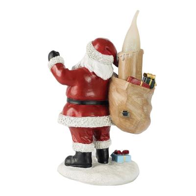 China Europe Christmas Statue Santa Claus With Led Candle Light For Resin Ornaments for sale