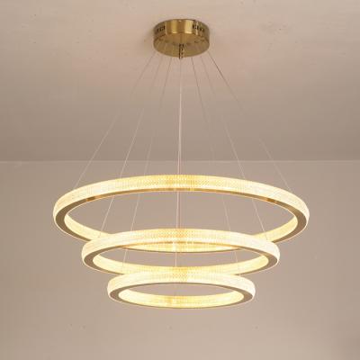 China Modern Simple Modern Style Gold Stainless Steel Chandelier Acrylic Round Lamp for sale