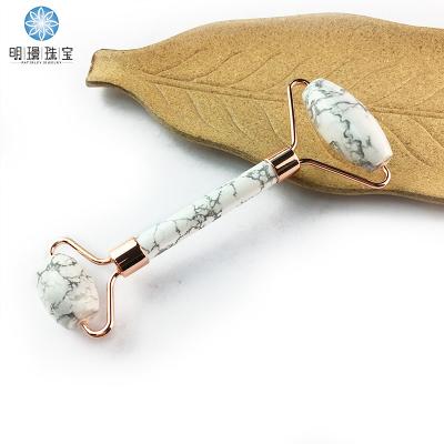 China Hot Sale Natural Stone Face Massager 100% Howlite Face Jade Roller Anti Aging White for sale