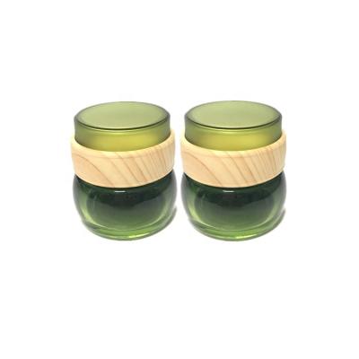 China Skin Care Beautiful Round 50g Cream Mask Jars/Promotional Glass Cosmetic Cream Jar/Green Empty Luxury Cream Bottles For Lady for sale