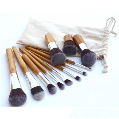 China Smudge Brush High Quality Makeup Brush Set 11 Piece Kabuki Brushes Wooden Handle Makeup Brush Set With Canvas Bag Packed for sale