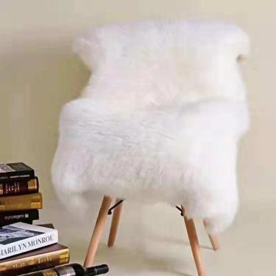 China Warm Customizable Skin Winter Figure Cushion Sheepskin Blanket for sale