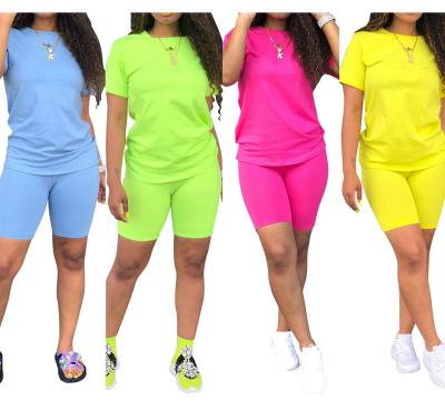 China 2022 Summer New Solid Color O Neck Breathable Short Sleeve T-shirt Women's Pack Top Hip Shorts Casual Sports Suit 2 Piece Sets for sale