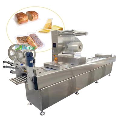 China Automatic Food Stretch Film Vacuum Packing Machine For Seafood Fresh-Cut Bread Vacuum Packing Machine for sale