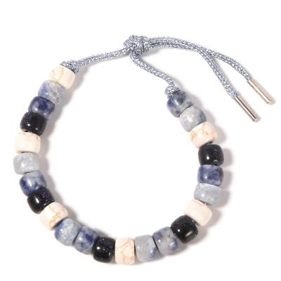 Chine Le Sodalite Howlite a perlé le bracelet 13.5g avec la corde argentée tressée à vendre