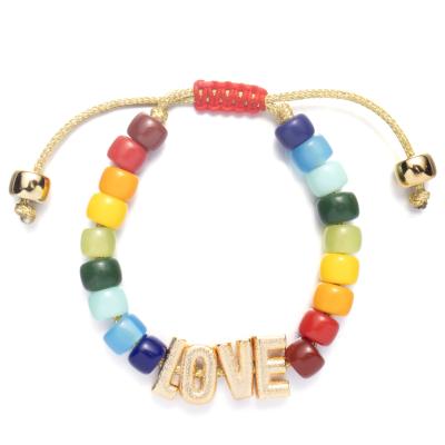 Chine Bracelet en nylon de perle de lettre d'amitié d'or d'OEM avec le fermoir réglable de tresse à vendre