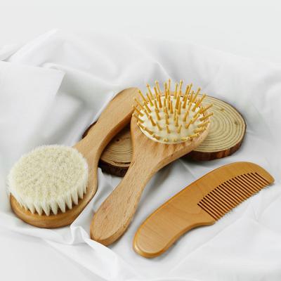 China Eco-friendly Natural Wooden Paddle Baby Hair Brush Comb Set Factory Wholesale Soft Goat Hair Brush for sale