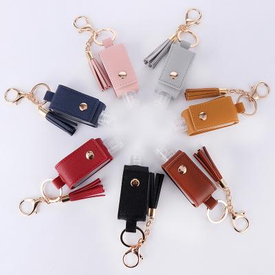 China PU Hand Sanitizer Bottle Holder Tassel Bag Leather Portable Tag Keychains Ebay New Leather Designs For Women for sale