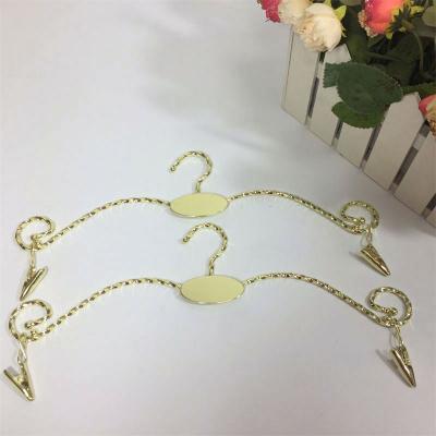 China 2021 Minimalist Gold Metal Hanger with Clothespins Clip for Bra Underwear Lingerie Panties Drying Rack Hanger Hook for sale