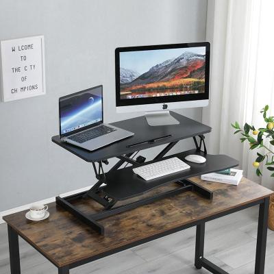 China Custom Ergonomic Adjustable Pneumatic Gas Riser Height Adjustable Standing Desk (Height) Converter with Keyboard Tray for sale