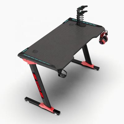 China Cost Effective Custom Home Office Computer Gaming Desk Convertible Black/Red/Pink Board With RGB Lights for sale