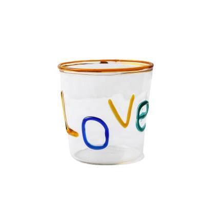 China Sustainable Girl Love Handmade Color 3D Letters Decorated High Borosilicate Large Capacity Glass Water Cup Love Glasses With Straw for sale