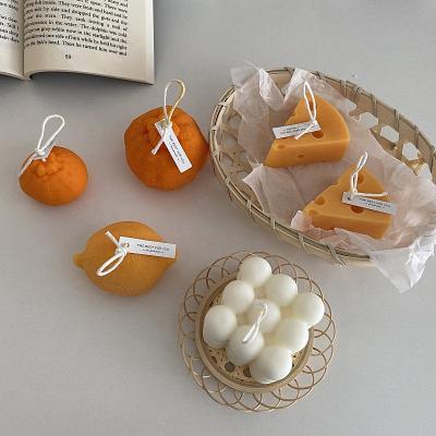 China Korean Smokeless Soy Wax Scented Candle Home Decoration Photo Props Shell Souvenir Lemon Cheese Ugly Orange Candle for sale