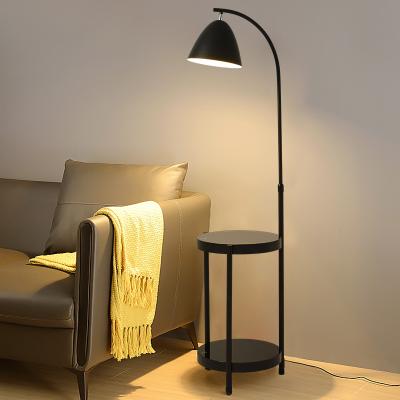 China Modern Stylish Gold And Black Floor Standing Lamp For Living Room Hotel Bedside Sdanding Floor Lamp With Table for sale