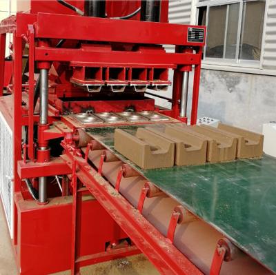 China JL4-10 hydraulic press interlocking block making machine for sale