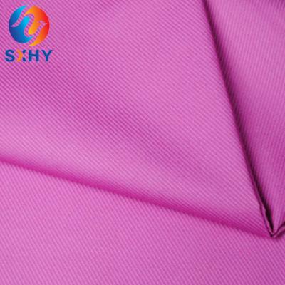 China Sustainable high quality 97% cotton 3/1 spandex 3% 32*21+70D 178*76 twill 3/1 stretch cotton twill fabric for pants for sale