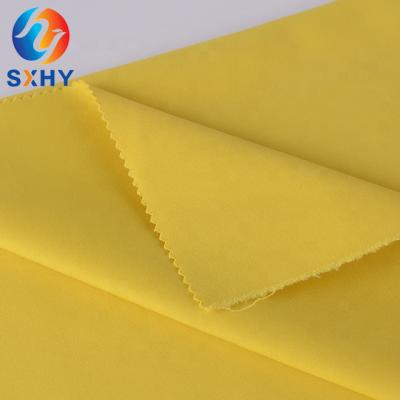 China TC 45*45 110*76 65/35 TC poplin polyester cotton waterproof single dyed raincoat fabric for beach shorts for sale