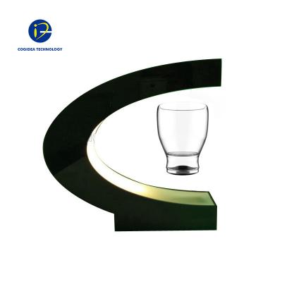 Κίνα Rotating Magnetic Levitation Cup Drinks Display Stand Magnet Floating Rotating Magnetic Levitation Cup Drinks Display προς πώληση