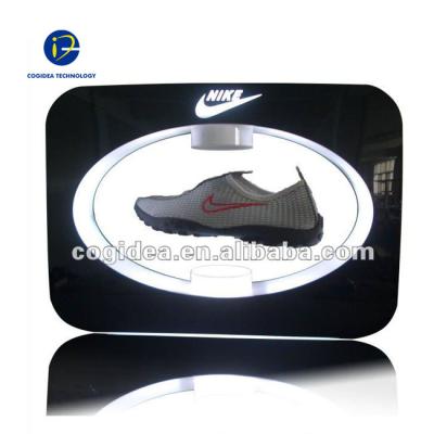 Cina Advertising high quality floating magnetic levitation shoes display, maglev POP shoe display in vendita