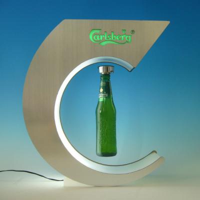 Cina nice noise magnetic levitating display led acrylic floating beer bottle display promotional products COG004-C in vendita