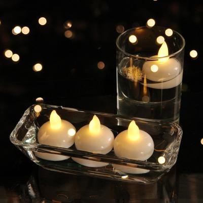 China Art Deco 12pcs Float On Water Home Decor Floating Led Battery Waterproof Flameless Party For Party Wedding Tea Light Candle Lamp Light for sale