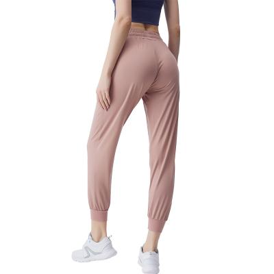 China High Jogger Women Drawstring Wast Workout Parride Bottom Tight Pants With Pockets for sale