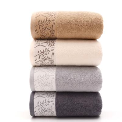 China 70*140cm Wholesale Soft Textile Compressed Jacquard China Cotton Bath Towel 100% Custom Beach Towel for sale