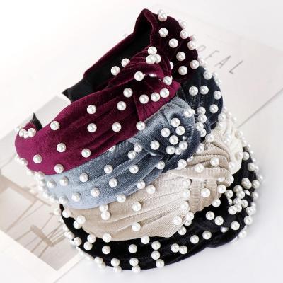 China 2022 European and American style solid color pilou bow pearl headband women Newstyle for sale