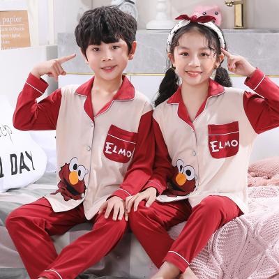 China QUICK DRY wholesale kids button cotton open chest pajamas set long sleeves and pants cute cartoon pattern for sale