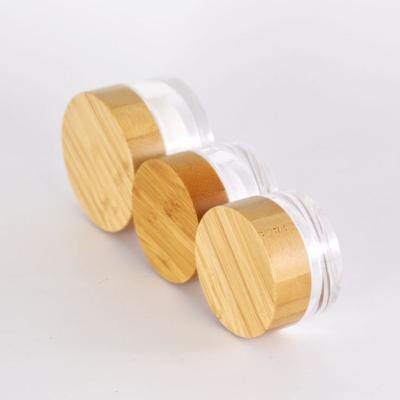 China Luxury cosmetic wooden cosmetic bottle 15g 30g 50g 100g clear round acrylic cosmetic jars with bamboo lid for sale