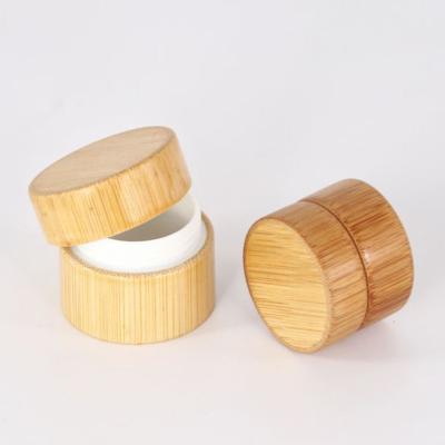 China Custom Cosmetic Bamboo Wood Cream Jar Empty Products Jar Plastic Bamboo Jars Eco-friendly Cosmetic Packaging PP With Bamboo Lid for sale