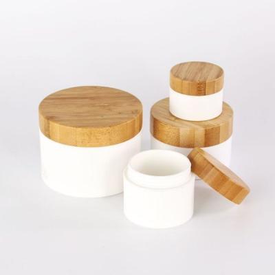 China Double Wall Cosmetic PP Jar With Bamboo Cap Cosmetic Packaging Jars 15g 20g 30g 50g 100g 150g 200g 250g for sale