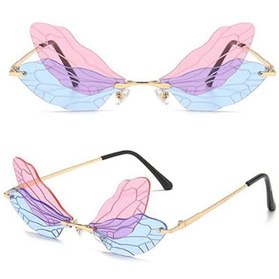 China Trendy Dragonfly Fairy BUTTERFLY Metal Rimless Sunglasses Wing Shaped Irregular Vintage Eyewear For Women Men Party for sale