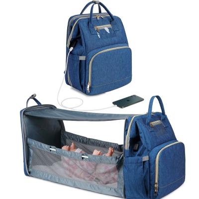 China WRAPPING BAG Diaper Bag With Changing Station Baby Diaper Bag Bed For Travel With Left USB Diaper Filler Bags for sale